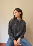 Cazadora cremallera tachas