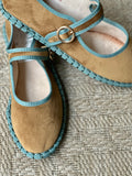 Bailarina turquesa/ocre