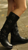 Bota altas hebillas