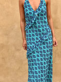 Vestido turquesa volantes