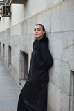 Jersey oversize negro cuello pelo