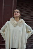 Jersey oversize beige cuello pelo