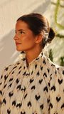 Vestido cuello engomado beig