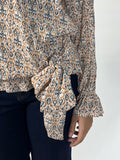 Blusa cruzada estampanda