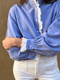 Camisa celeste rayas volante troquelado