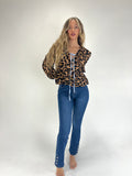 Jeans flare botones bajo