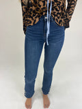 Jeans flare botones bajo