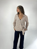 Blusa cruzada estampanda